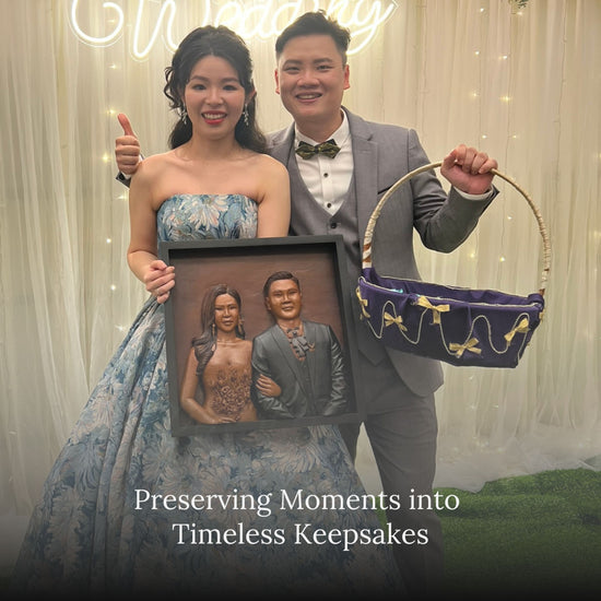 A couple at their wedding party showcasing their personalized portrait sculpture with the text 'Preserving Moment into timeless keepsake' - a representation of our personalized portrait carving service.