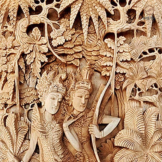 This wooden relief carving depicting the figures of Rama and Sita, is truly one of a kind piece of artwork. If you crave a piece of unique, alluring, and beautiful art, this piece is for you. This piece is incredibly ornate and will look equally as lovely mounted on a wall or placed on a bookshelf.